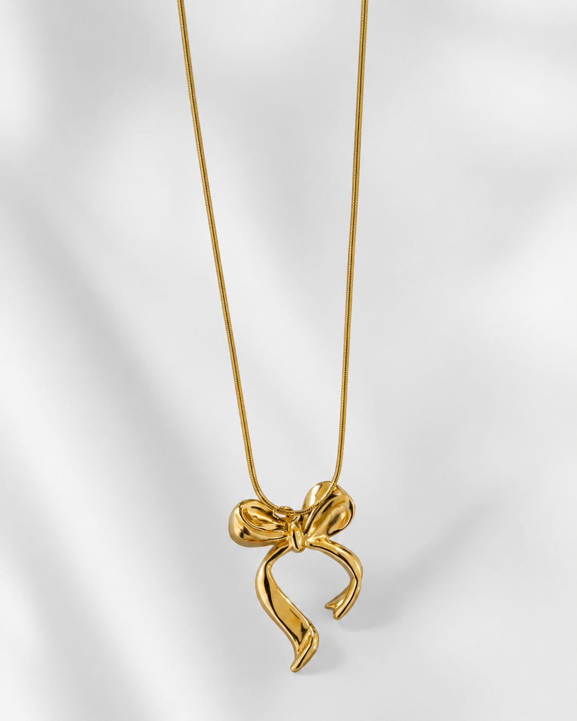 Elegant Bow Pendant Necklace